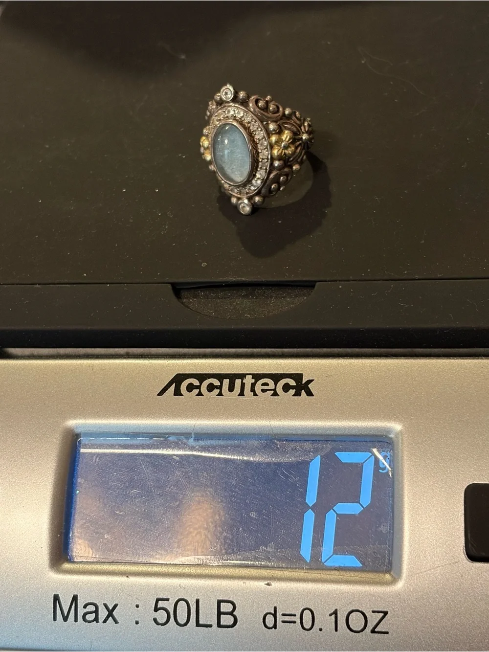 Barbara Bixby sterling and 18k yellow gold sky blue and white topaz ring.